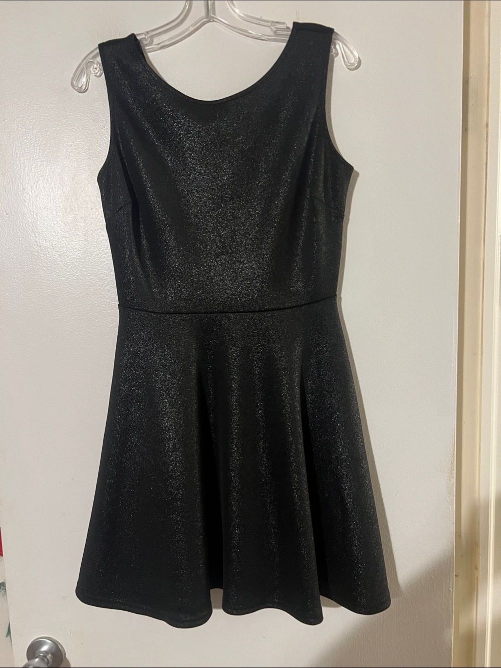 Aqua fit and flare sleeveless dress. Back strap detail.